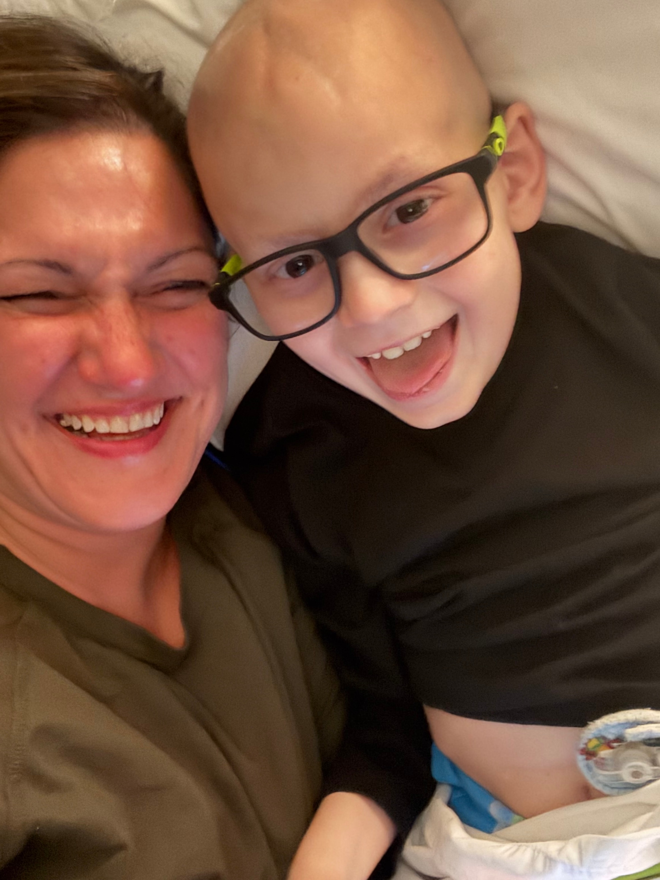 Hank laughing with mom